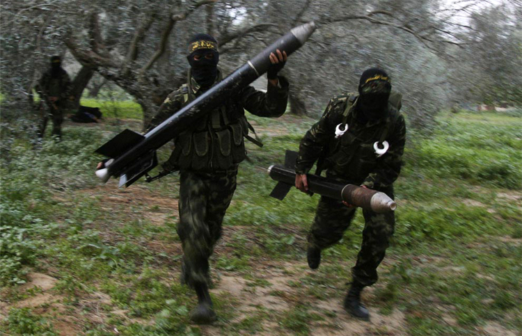 Hamas QASSAM rocketeers rushing to the launch position 