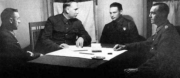 Don Front HQ. From left to right: General K. Rokossovsky, Marshal of Artillery N. Voronov, translator Major Diatlenko, and Field Marshal von Paulus, who was taken prisoner by the troops of the 64th army under General N. Shumilov 
